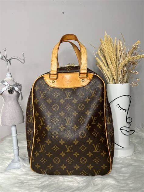 louis vuitton slangenleren reistas|louis vuitton handbags.